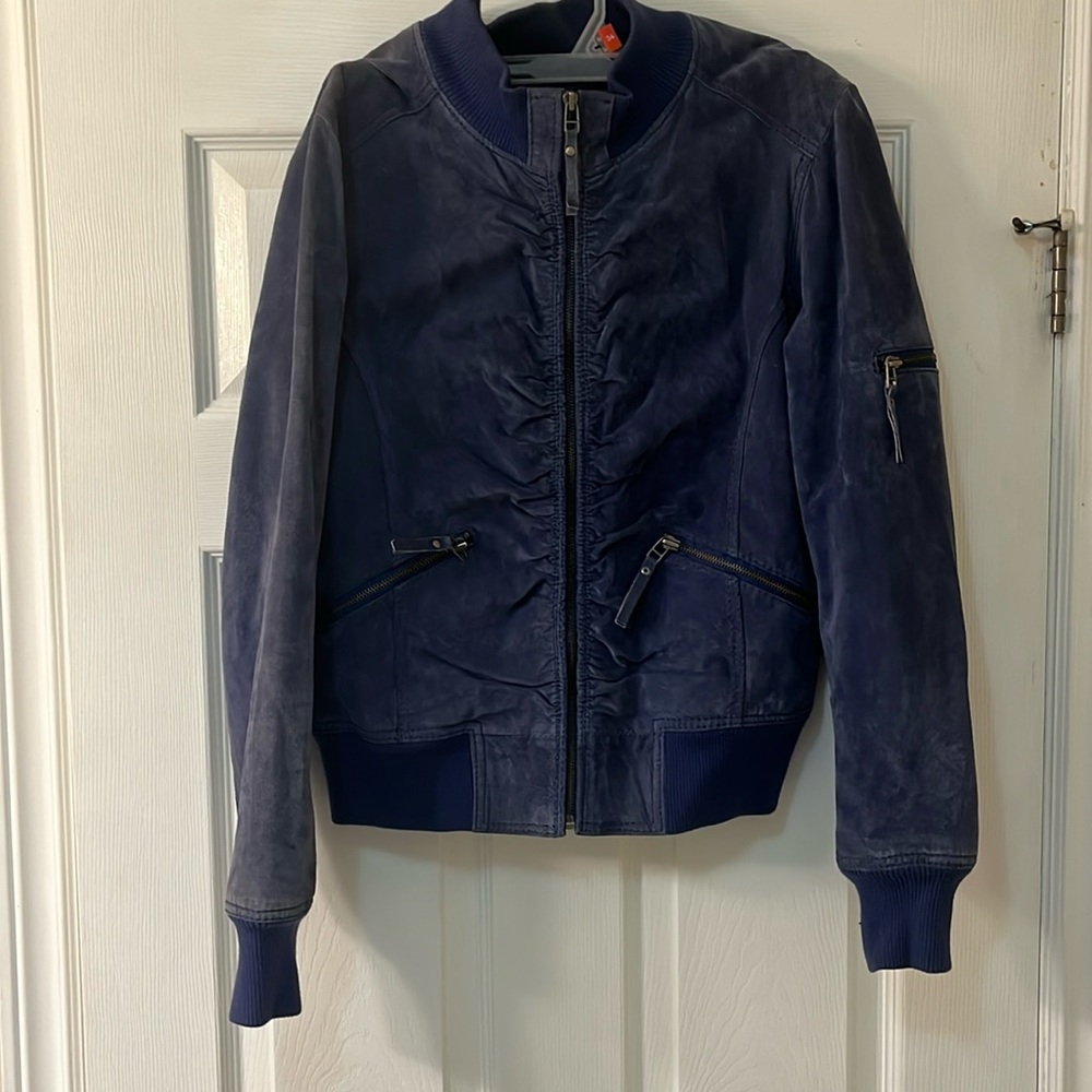 A dark periwinkle shade bomber coat